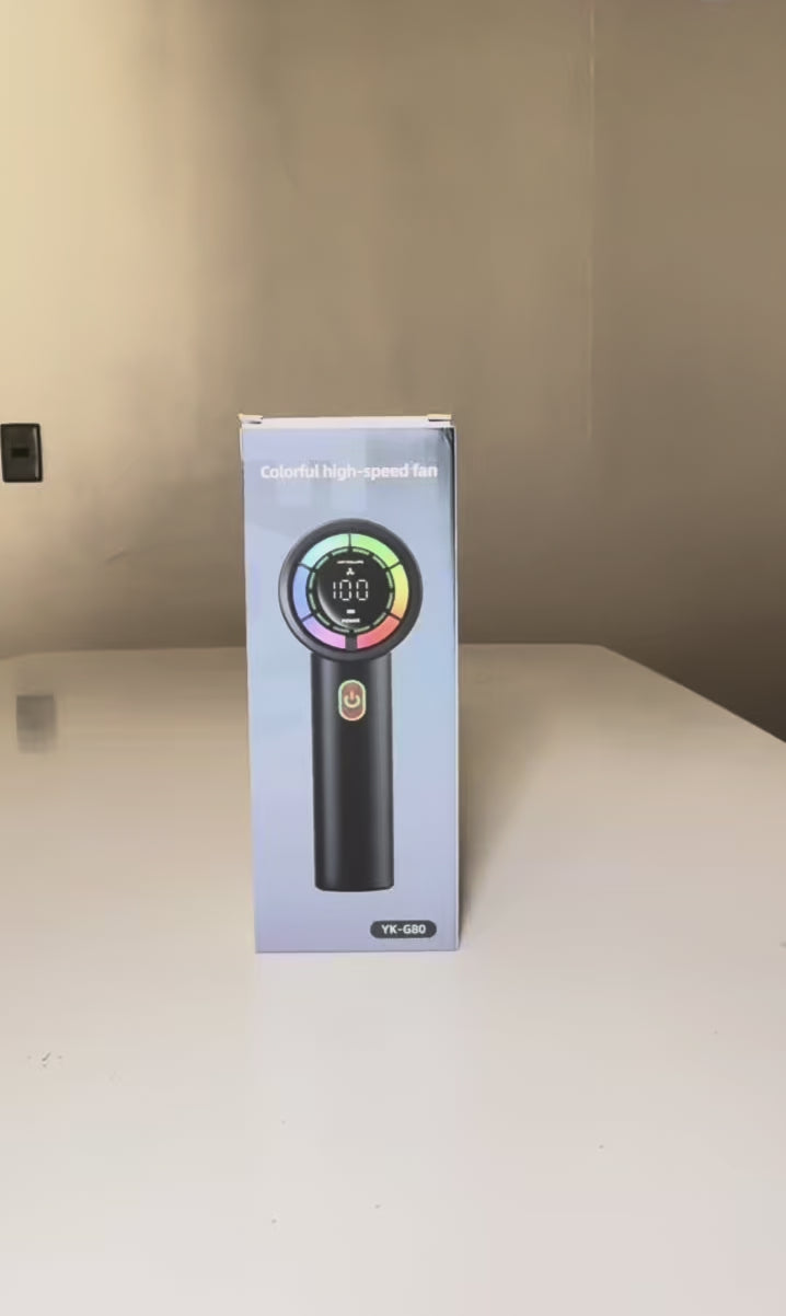 Cargar video: Mini Ventilador Portátil Recargable Pantalla Digital y Luz